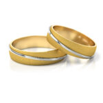 Obrączki ślubne złote dwukolorowe jedna na drugiej