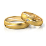 Obrączki ślubne złote nowoczesne z kamieniami 3d