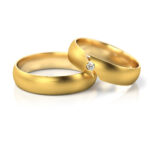 Obrączki ślubne złote półokrągłe z diamentem