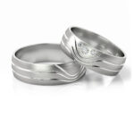 Obrączki ślubne nowoczesne białe złoto półokrągłe z kamieniami