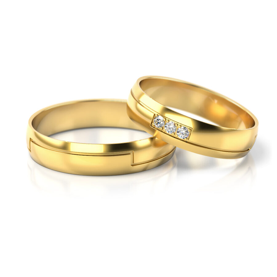 Obrączki ślubne złote półokrągłe z kamieniami diamenty lub cyrkonie