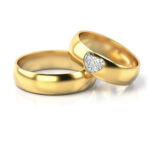 Obrączki ślubne złote półokrągłe z kamieniami serce diamenty lub cyrkonie