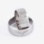 Obrączki ślubne złote szerokie białe złoto kokarda kokardka