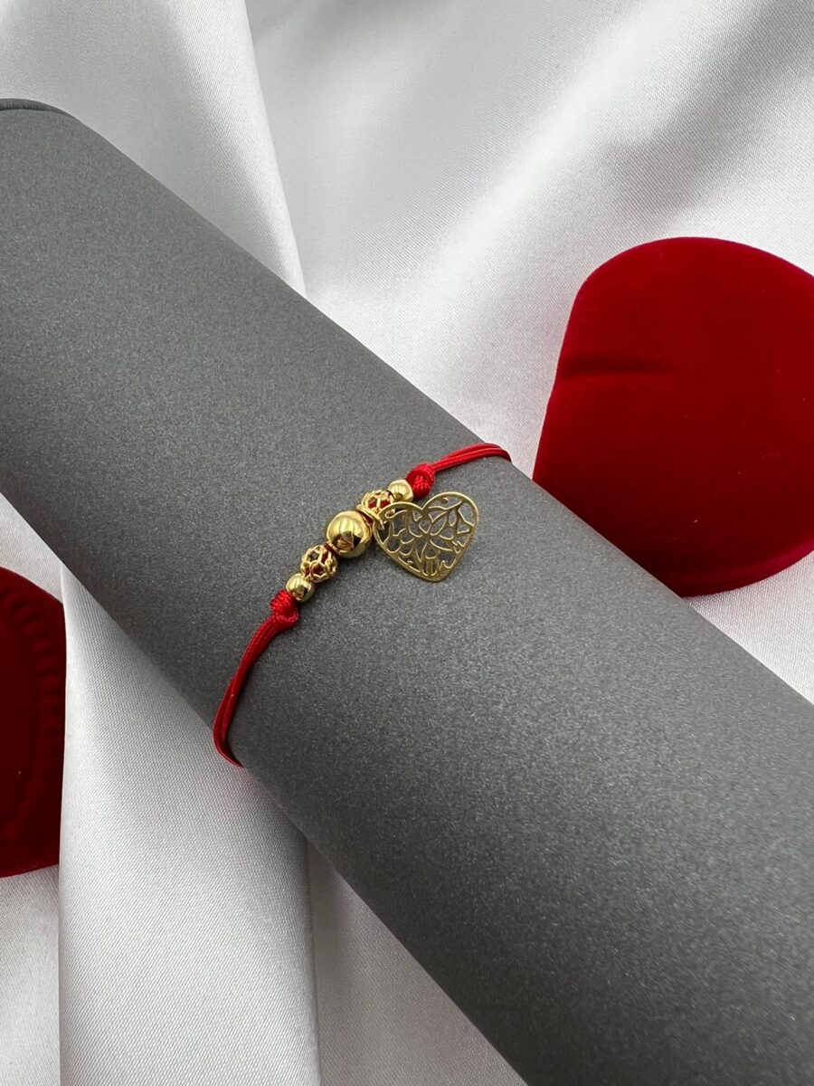 Bransoletka na czerwonym sznurku zaciągana złocona serce ażurowe kulki 24 karatowe złoto srebro 925