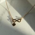 Naszyjnik pozłacany znak nieskończoności serduszko wiszące prezent dla niej celebrytka