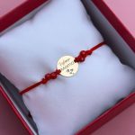 Bransoletka najlepsza mama czerwony sznurek złota złoto 585 dzień matki dla mamy prezent dla matki koraliki kamienie naturalne na sznureczku korale