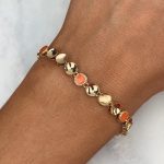 Złota bransoletka okrągłe ogniwka ogniwa wklęsłe połączone kółeczka pomarańczowa emalia mat połysk złota bransoletka z kolorem złoto 585 14kt dall'acqua