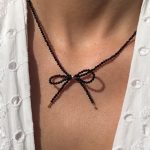 Naszyjnik kokardka czarne koraliki spinel pozłacany srebro 925 modny delikatny naszyjnik czarny