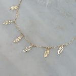 Złota bransoletka na nogę na stopę na kostkę wiszące listki zawieszki złoto 585 14k bransoletka na lato ażurowe zawieszki mieniąca się