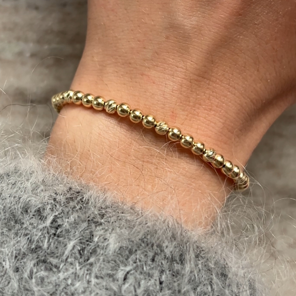 Złota bransoletka kulki kuleczki diamentowane mieniące się cała ze złotych kulek nacinanych błyszczących gładkich kulek wyjątkowych złoto 585 14k prezent dla niej