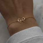 Złota bransoletka kokardka kokardka dla niej delikatna minimalistyczna złoto 585 14k prezent dla niej złota wyjatkowa bransoletka wzór kokardki bow